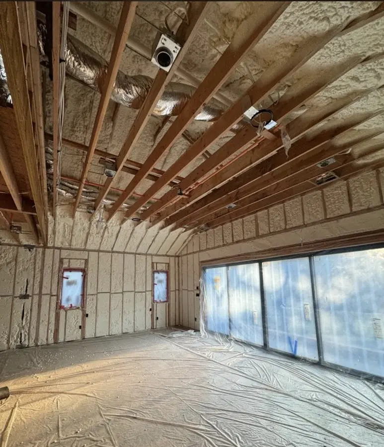 Interior walls and ceiling insulated with spray foam during new construction in Lake Station